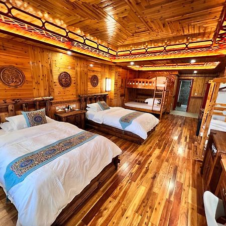 Baike Boutique Hotel Лунгшен Номер фото