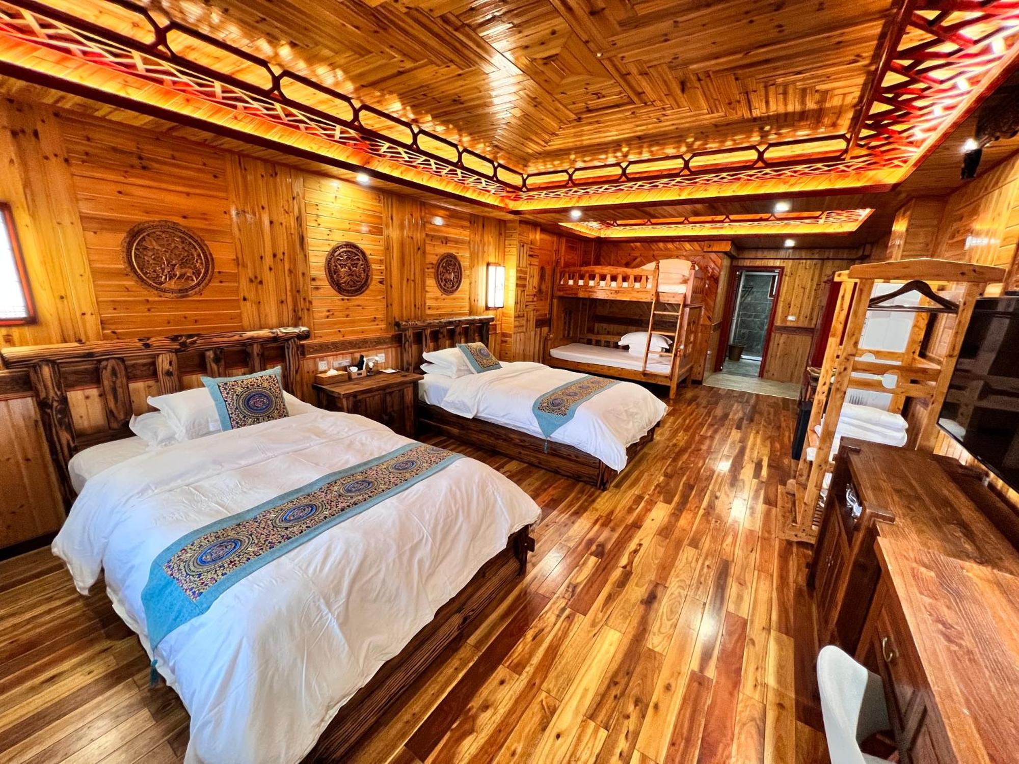 Baike Boutique Hotel Лунгшен Номер фото