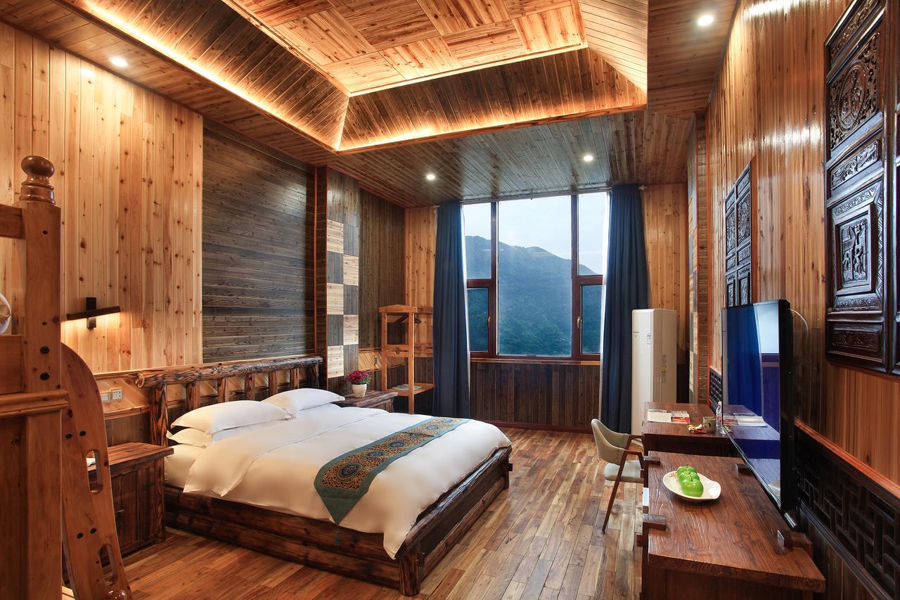 Baike Boutique Hotel Лунгшен Екстер'єр фото